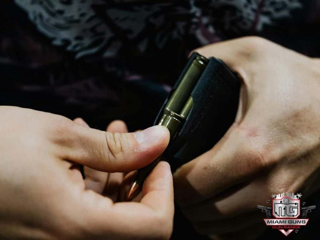 Person reloading bullets for their firearm. Best Gun Store And Range In Miami: Why Miami Guns Should Be Your First Stop